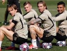 Cierran filas. Jugadores del Real Madrid realizaron ayer su última práctica para el juego de hoy ante el Manchester City. AFP