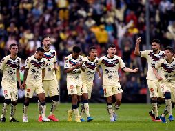 LIBERADOS. El América respira al calificar a los Cuartos de Final, tras una eliminatoria muy ríspida ante el conjunto guatemalteco. AFP