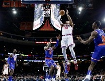 DESTACADO. Tobias Harris (#12) aportó 34 puntos para la victoria de los Sixers. AP
