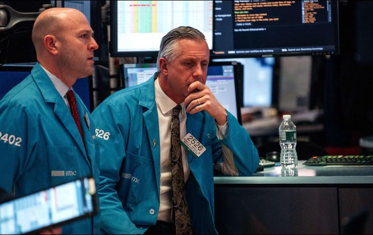 Los precios de los bonos se incrementaron luego que los inversionistas recurrieron a ellos para proteger su dinero. AFP/H. Heins