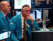 Los precios de los bonos se incrementaron luego que los inversionistas recurrieron a ellos para proteger su dinero. AFP/H. Heins