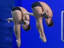 Iván García y Kevin Berlín en salto desde la plataforma de 10 metros. AP/G. Hughes