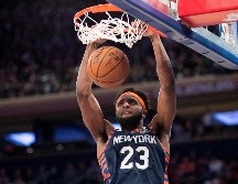 Mitchell Robinson (#23) aportó 23 puntos para el triunfo de los Knicks. AP/M. Lennihan