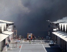El siniestro provocó una enorme columna de humo, fácilmente visible desde varios puntos de Santiago. AFP/Y. Yankovic-ATON Chile