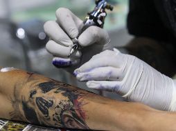Ante la violencia que se vive, entre la población surge la dinámica de enlistar características de su cuerpo, como señas particulares o tatuajes. EL INFORMADOR / ARCHIVO