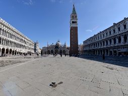 La Plaza de San Marcos en Venecia luce hoy casi desierta, al entrar en vigor la cuarentena hasta el 3 de abril. AFP/A. Pattaro