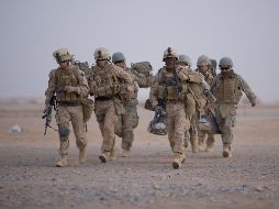 Estados Unidos tiene que reducir inicialmente sus tropas de 12 mil o 13 mil  a 8 mil 600 hasta mediados de julio. AFP/ARCHIVO