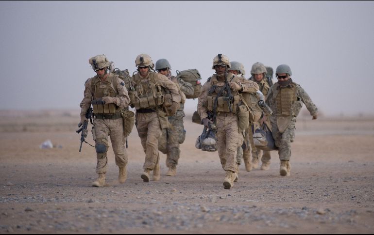 Estados Unidos tiene que reducir inicialmente sus tropas de 12 mil o 13 mil  a 8 mil 600 hasta mediados de julio. AFP/ARCHIVO