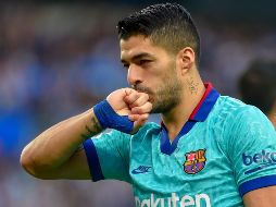 El aplazamiento del torneo a causa del coronavirus permitiría al delantero del Barcelona disputar el último partido en caso de que su equipo llegue a dicha ronda. AFP / ARCHIVO