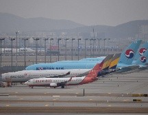 Aviones de varias compañías están estacionados en la pista del aeropuerto internacional Incheon en Seúl, Corea del Sur. AFP/Jung Yeon-je