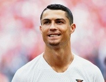 SE PONE LA CAMISETA. El astro portugués se encuentra en cuarentena en su país ante la pandemia. IMAGO7
