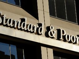 La calificadora hace ajustes negativos ante la debilidad económica que prevalece en México. AP/ARCHIVO