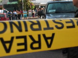 El cadáver quedó sobre la vía pública. EL INFORMADOR / ARCHIVO