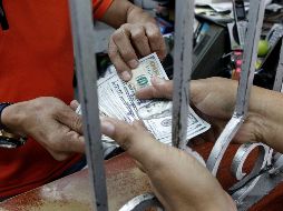 Calculan que cada mexicano transfirió a sus familiares un monto promedio de 321 dólares. EL INFORMADOR/ARCHIVO