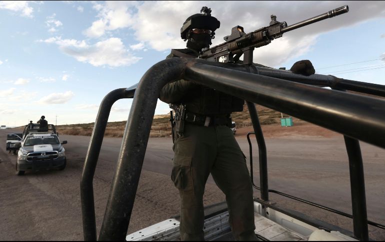 Autoridades decomisaron en el lugar dos granadas, dos vehículos y 18 armas largas. AP/ARCHIVO