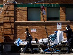 Los expertos han sido cautelosos ante la tendencia al alza en contagios y fallecidos en EU. EFE / J. Lane