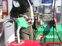 Entre los bienes y servicios cuya baja de precios contribuyeron se encuentran las gasolinas de alto y bajo octanaje, con un descenso mensual de 7.24% y 6.30% respectivamente. EL INFORMADOR / ARCHIVO