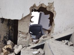 El detenido ingresa a un negocio de colchones en una pequeña plaza comercial ubicada en la calzada Olímpica y Río Nilo, a través de un orificio en el muro. ESPECIAL