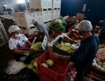 Para entregar las despensas de 23 kilogramos, Romo explica que cuentan con un padrón de cada comunidad. EL INFORMADOR / F. Atilano