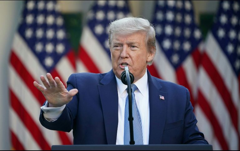 “Creemos que algunos de los estados pueden abrirse antes de la fecha límite del 1 de mayo”, informó Trump. AFP/M. Ngan