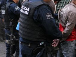 Policías realizaron el aseguramiento en el cruce de la avenida Colón y la calle Alemania, en la colonia Morelos. EL INFORMADOR/ARCHIVO