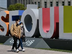 De los 10 mil 702 casos de coronavirus, sólo 207 dieron positivo por la enfermedad de nueva cuenta. AFP / J. Yeon-je