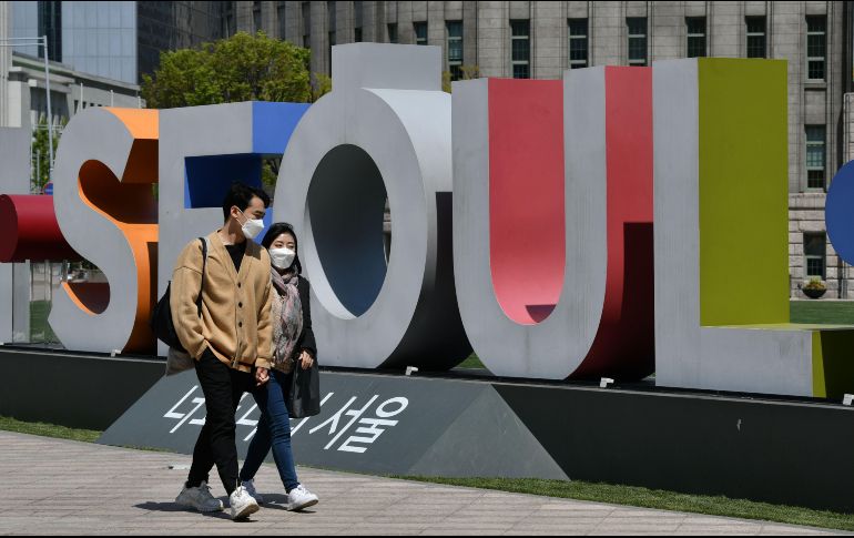 De los 10 mil 702 casos de coronavirus, sólo 207 dieron positivo por la enfermedad de nueva cuenta. AFP / J. Yeon-je