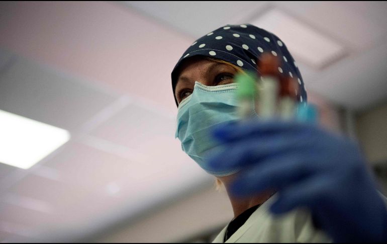 Beijing advierte que no permitirán la entrada a su país con la intención de rastrear el origen del patógeno mientras la pandemia continúa. AFP / T. Fabi