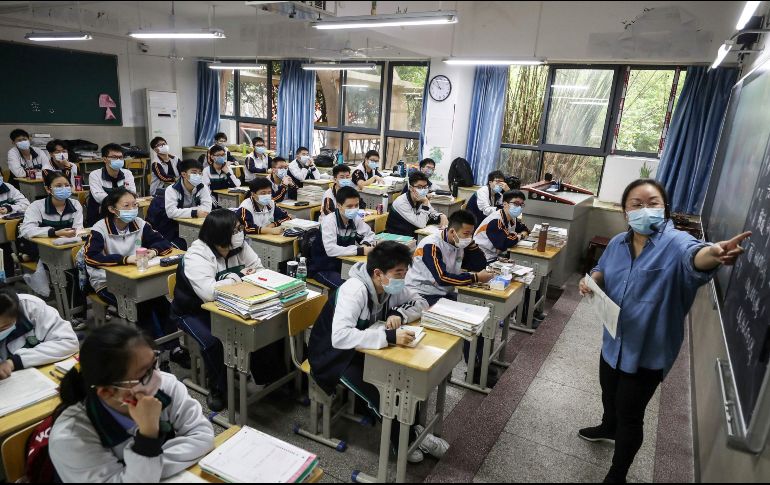 Autoridades de China no han confirmado fechas de reingreso a la aulas para alumnos del nivel primario y vocacional. AFP /