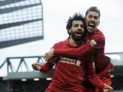 SIN FESTEJO. De confirmarse las medidas de prevención, el Liverpool podría proclamarse campeón sin festejar sus goles ni el título en equipo. ARCHIVO