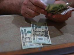 El optimismo de este viernes empujó a los inversionistas a comprar más activos riesgosos, como el peso mexicano. EL INFORMADOR/ARCHIVO