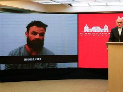 El ministro venezolano de Comunicación, Jorge Rodrúguez, muestra un video de Airon Berry, uno de los mercenarios al servicio de Silvercorp USA. AP/Ministerio de Comunicación