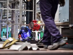 Las manufacturas son las más impactadas, acelerando su caída respecto a febrero al caer 4.8%. AFP / ARCHIVO