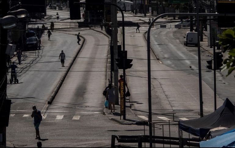 Una avenida cerrada para evitar la concentración de personas en la zona norte de la ciudad de Río de Janeiro. Entre el 21 y 25 de febrero, Brasil celebró el carnaval, que atrae a grandes multitudes a las calles de ésta y otras ciudades. EFE/A. Lacerda