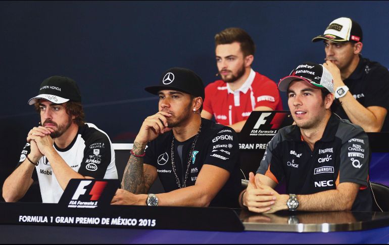 INJUSTOS. Para Maldonado (fondo), Pérez es un piloto que puede hacer grandes cosas con un mejor coche. AFP / C.Mason