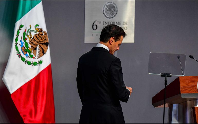 La empresa ligada a Peña Nieto recibió en 2014 el Premio Nacional de Calidad de manos del propio ex mandatario. AFP / ARCHIVO