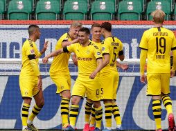Con goles del portugués Raphaël Guerreiro, al minuto 32, y del marroquí Achraf Hakimi, al 78, el Borussia impuso condiciones en campo ajeno para borrar del campo al equipo de los Lobos y sumar 57 puntos en el subliderato. EFE / M. Sohn
