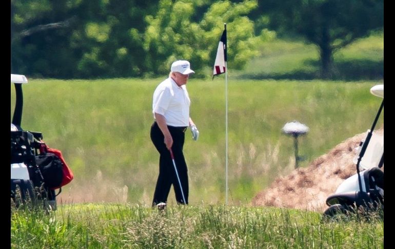 El presidente volvió a uno de sus campos de golf después de 75 días. EFE/J. Lo Scalzo