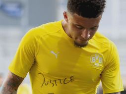 APOYO. Jadon Sancho, del Dortmund, se sumó. EFE