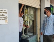 Comerciantes de la zona están molestos pues ya estaban listos para iniciar actividades después de estar con las cortinas abajo por dos meses. EL INFORMADOR / G. Gallo