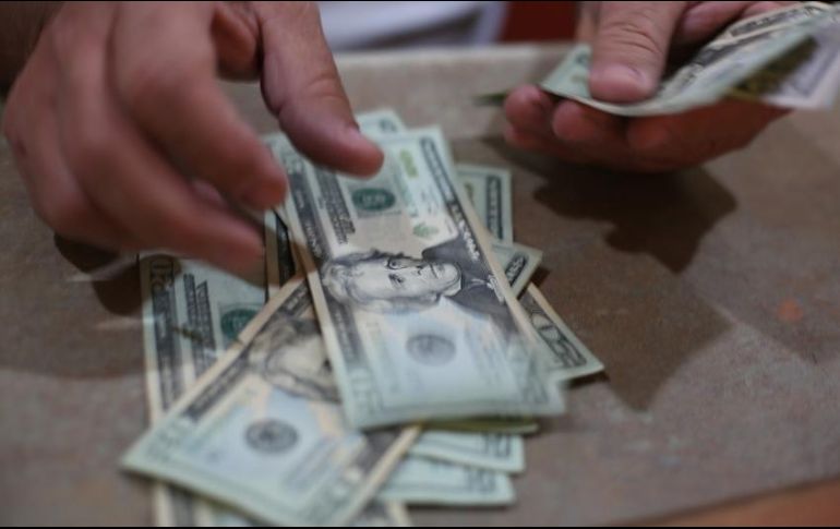 Se espera un tipo de cambio cotice entre 21.35 y 21.80 pesos por dólar.EL INFORMADOR/ARCHIVO