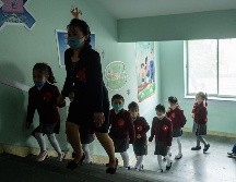 Dos adultos sufrieron heridas más graves, pero ninguna víctima corre peligro de muerte. AFP/W. Kim