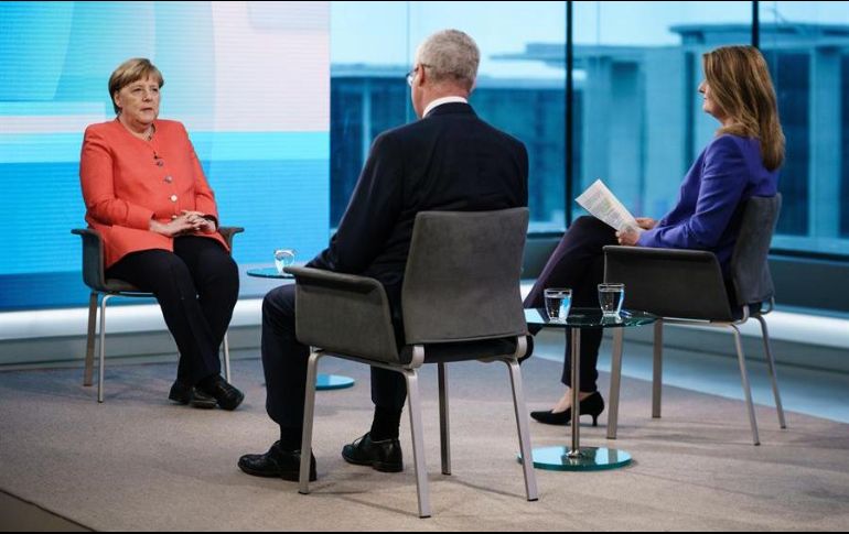 Este jueves, se transmitió una entrevista a Angela Merkel por la cadena televisiva estatal ZDF. EFE/C. Bilan