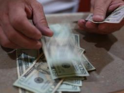 Antes del inicio de la pandemia, el dólar se cotizaba a a venta en alrededor de 18.50 pesos. EL INFORMADOR/ARCHIVO