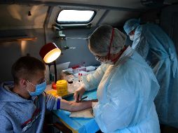 La OMS estima que los contagios asintomáticos probablemente representen apenas el 6% de la propagación. AFP/P. Korolyov