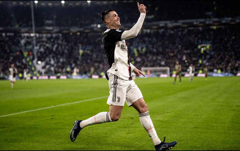 Cristiano Ronaldo fue clave en el partido de ida, consiguiendo de penal, en los últimos minutos, el empate en San Siro. AFP / ARCHIVO