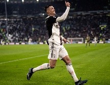 Cristiano Ronaldo fue clave en el partido de ida, consiguiendo de penal, en los últimos minutos, el empate en San Siro. AFP / ARCHIVO
