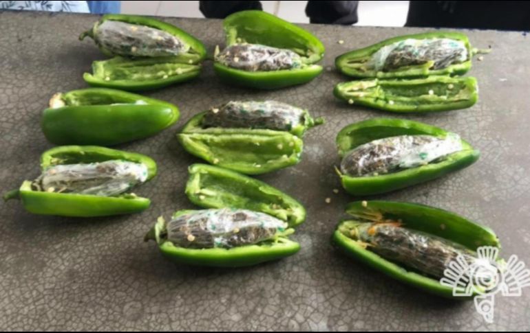 El ''alimento'' sería entregado por un familiar a uno de los internos. ESPECIAL / Secretaría de Seguridad Pública de Puebla