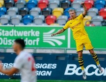 El Dortmund se sitúa provisionalmente a cuatro puntos del Bayern, que tiene este sábado un complicado desplazamiento al templo del Gladbach. AFP / L. Kuegler