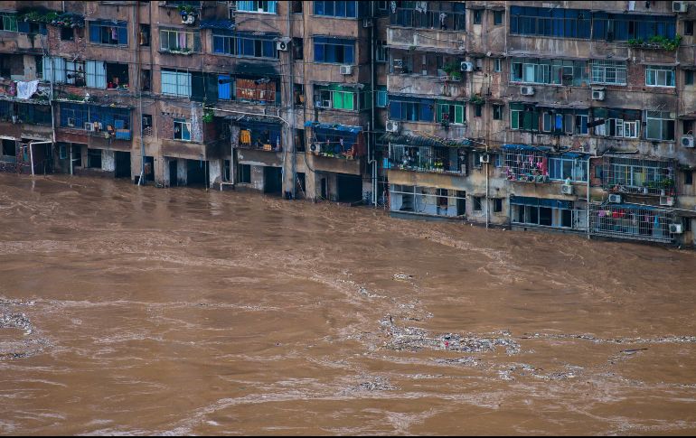 En todo el país, los desastres relacionados con las inundaciones destruyeron 17 mil hogares. AP / C. Xingyu